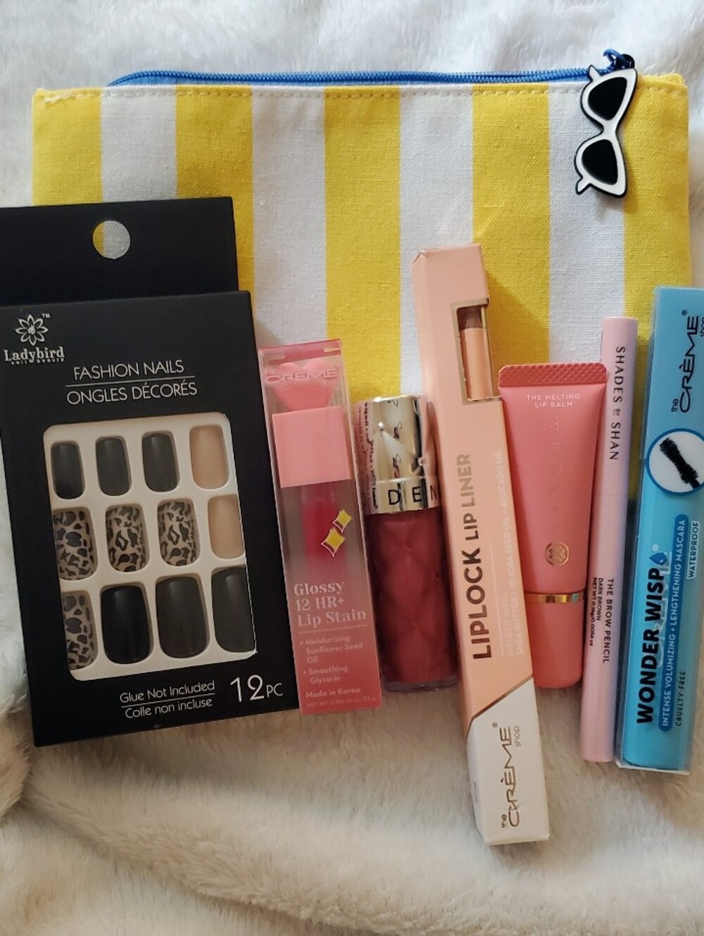 Assorted Women’s Makeup Kit with Pink Lip Products and Nails In A Pouch